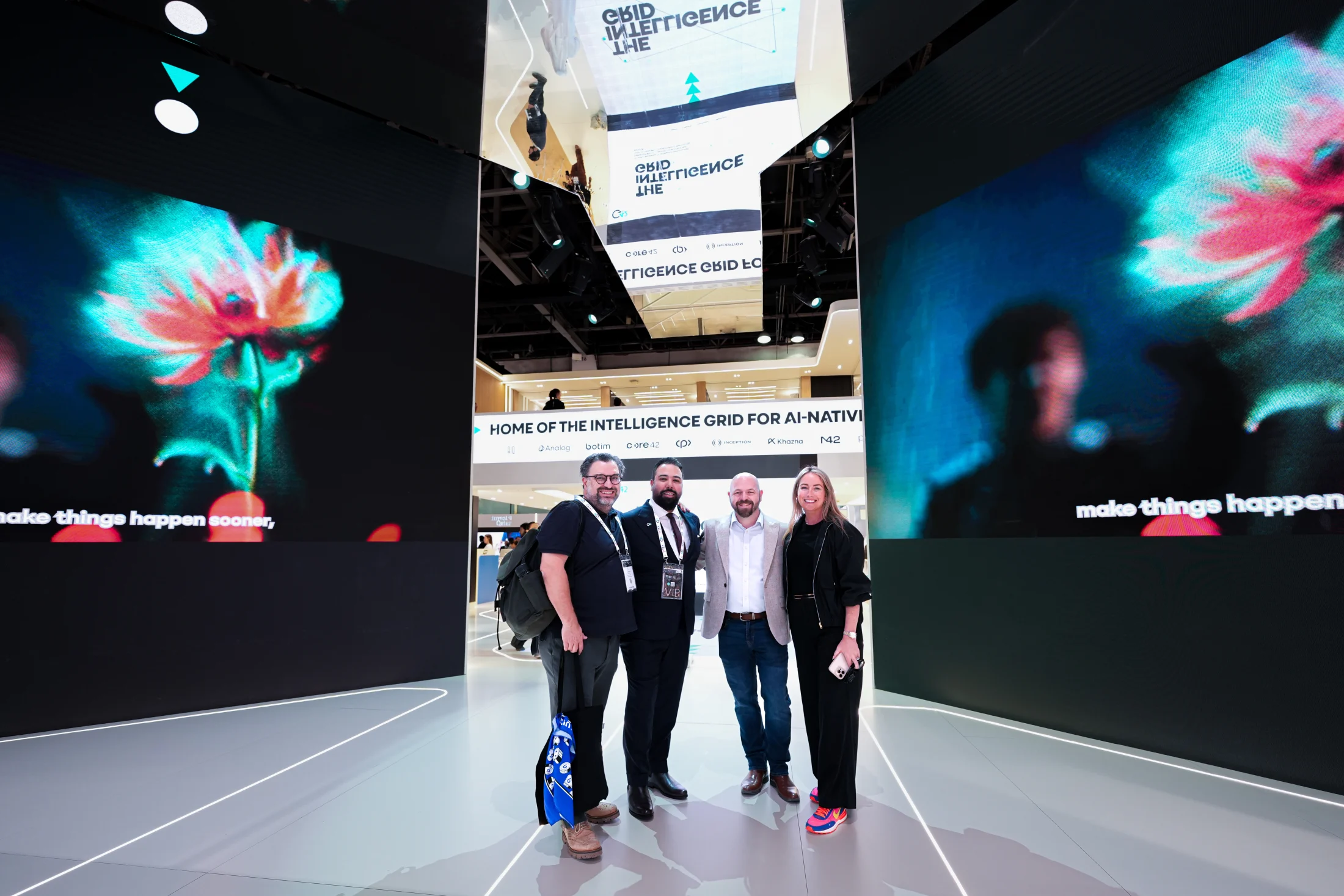 The team in the District entrance, framed by the Intelligence Grid